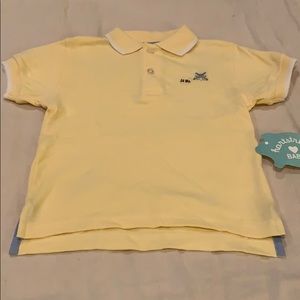 Yellow polo golf shirt